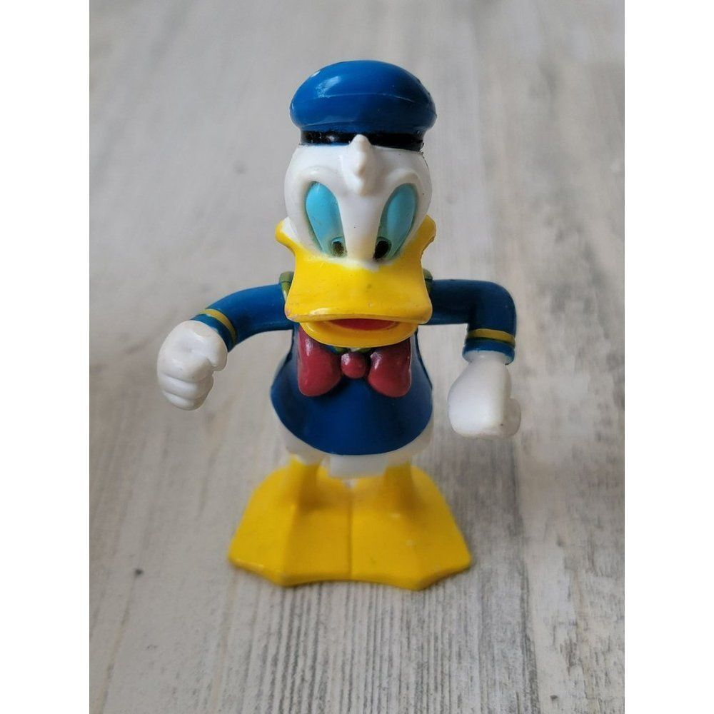 Vintage Donald Disney duck toy figure Pixar bow‎